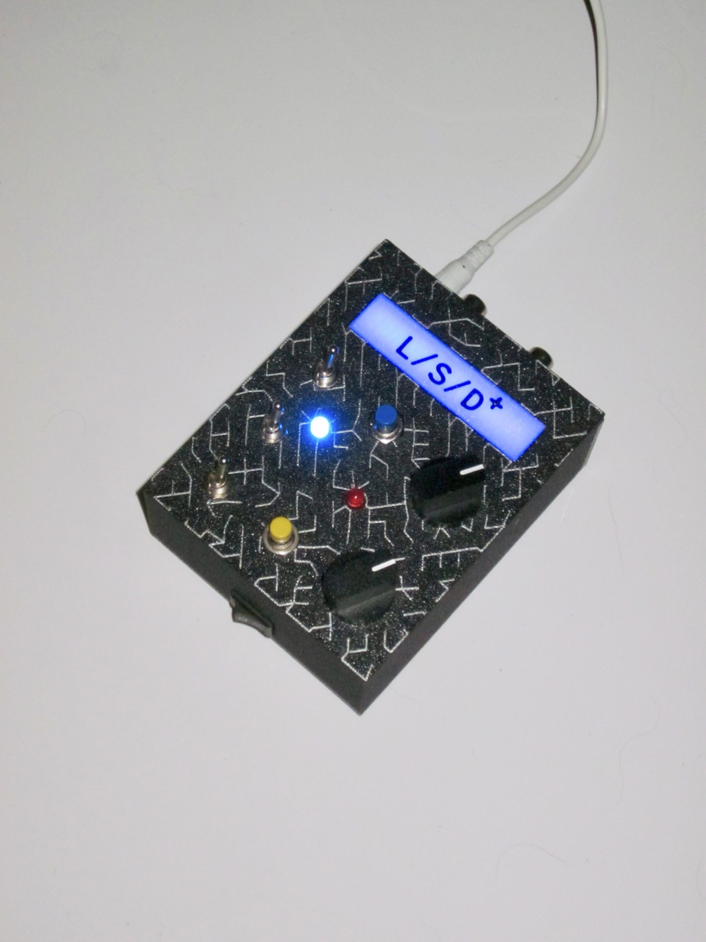 LSD+ S1·02 — Circuit-maze linework, blue backlight